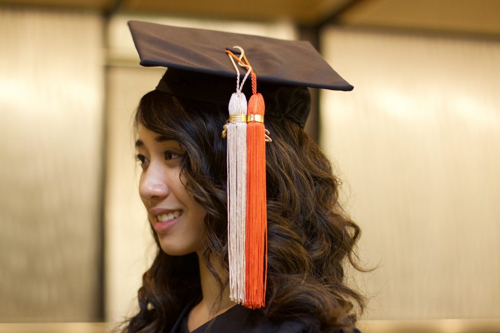female in graduation regalia