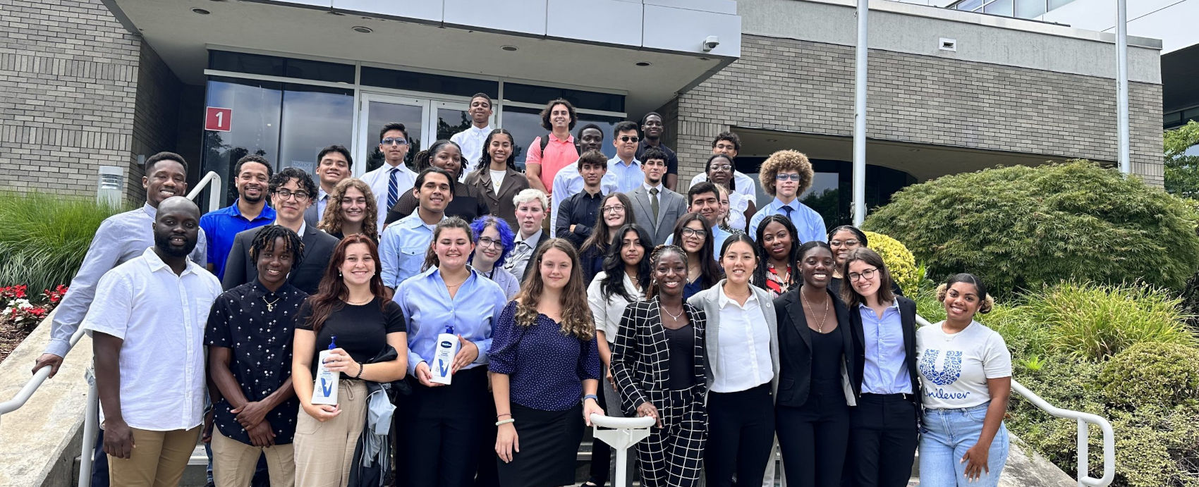 BRIDGE program - students standing in front of a entrance